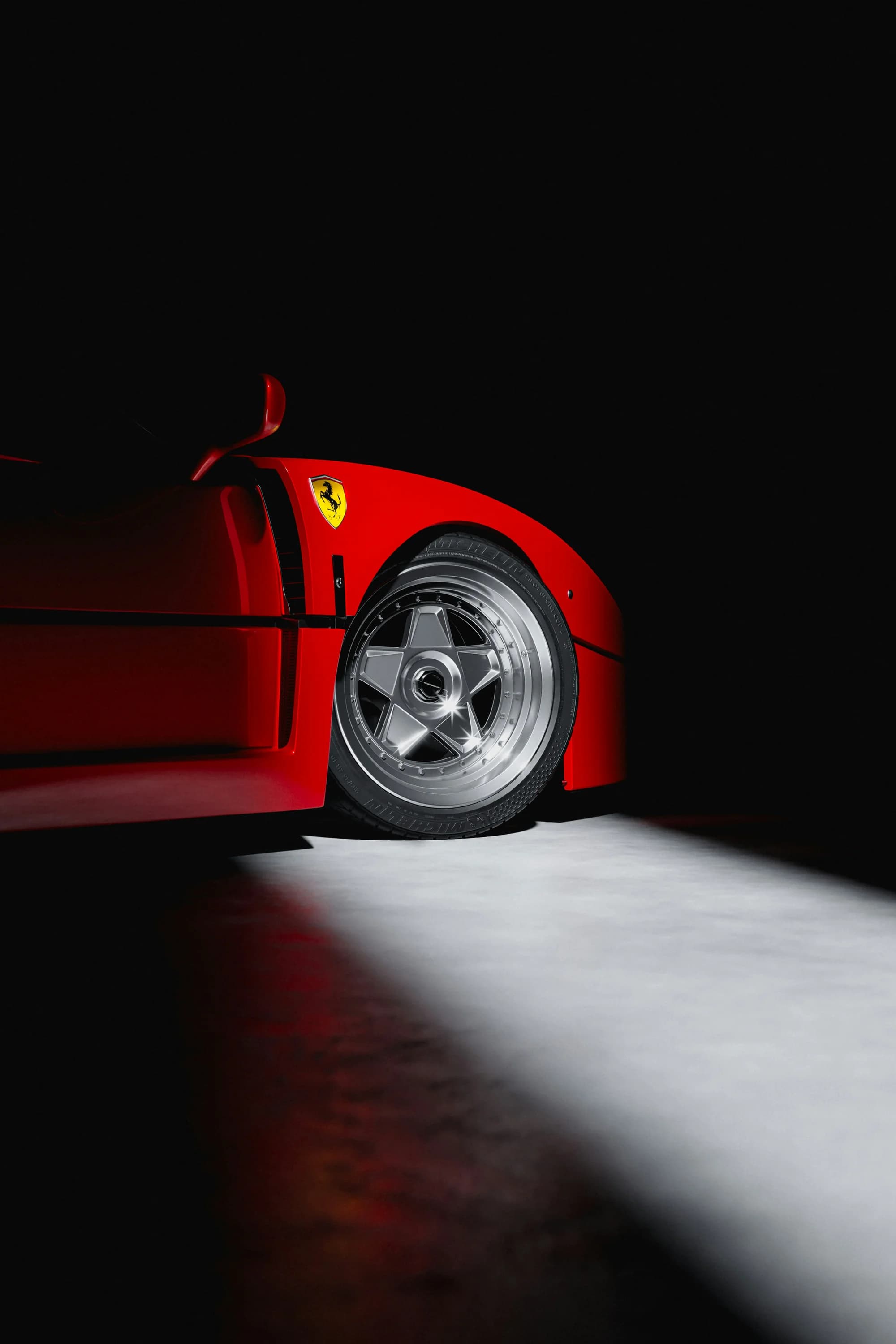 Ferrari F40 wheel detail in dramatic light